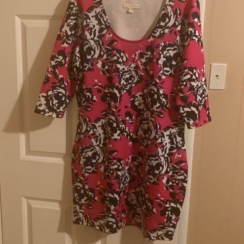 Fuchsia,white, & black rose dress with round neck.